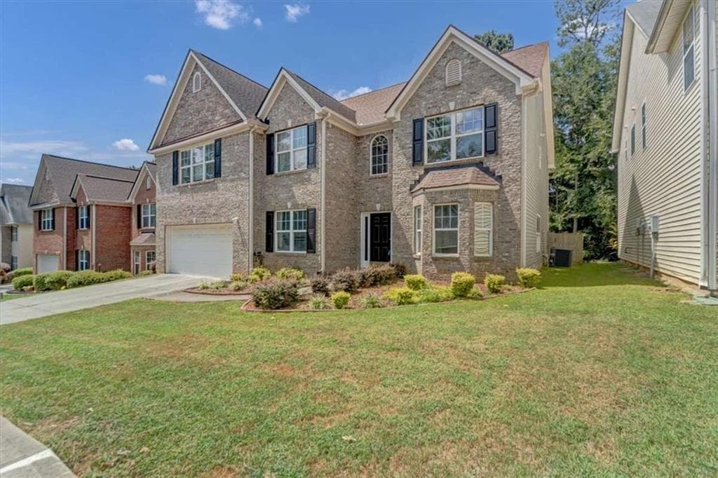 5 bedroom, 4 bathroom, 3,417 sq ft single family residence for sale at 4633 Beau Point Court, Snellville, GA 30039 — photo 2