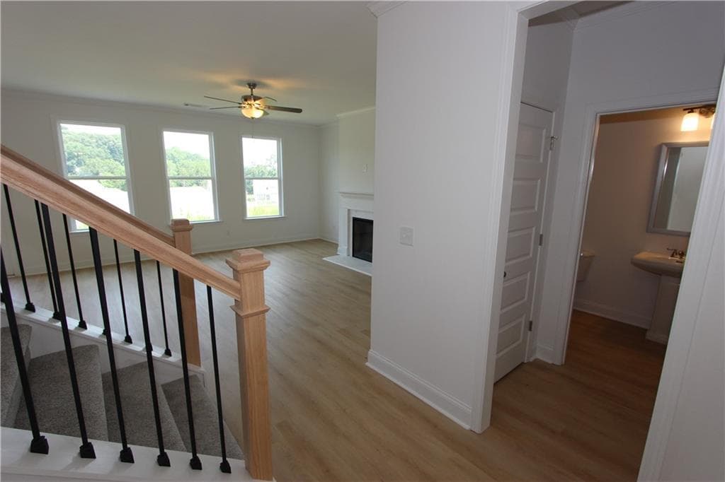 5 bedroom, 4 bathroom, 2,562 sq ft single family residence for sale at 7419 Rocklin Lane, Flowery Branch, GA 30542 — photo 4