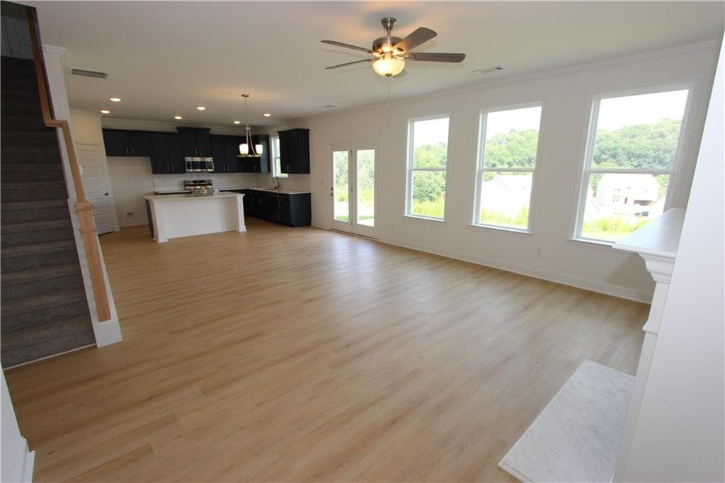 5 bedroom, 4 bathroom, 2,562 sq ft single family residence for sale at 7419 Rocklin Lane, Flowery Branch, GA 30542 — photo 5