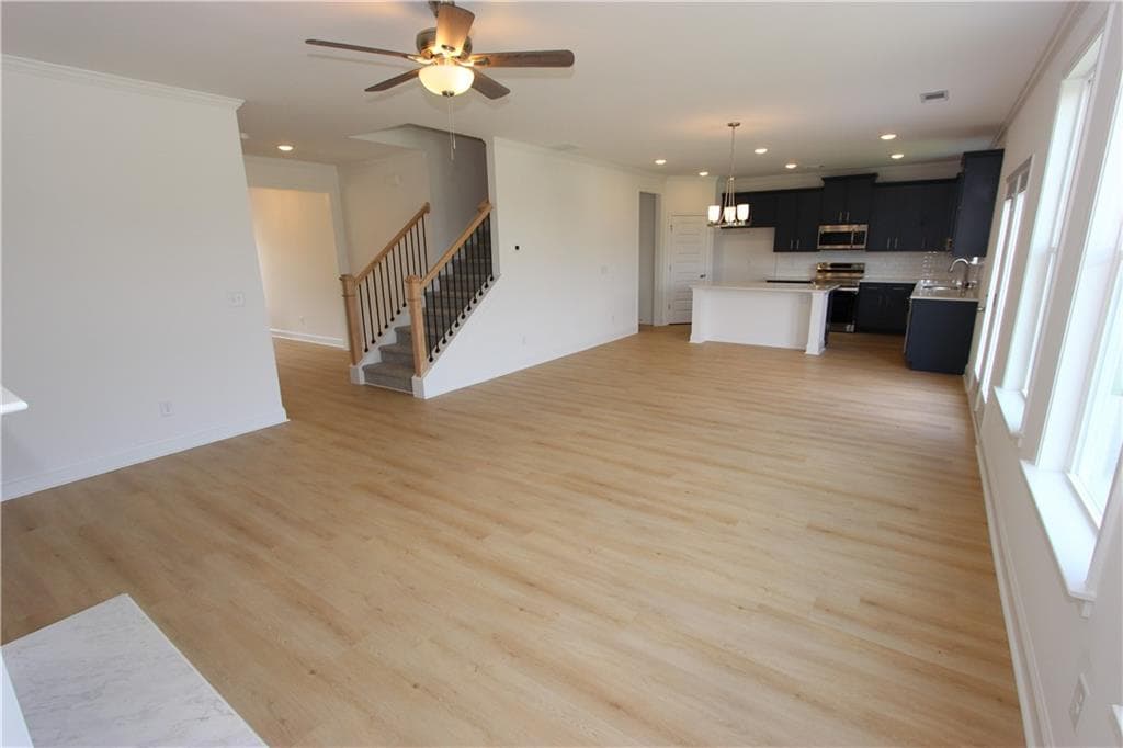5 bedroom, 4 bathroom, 2,562 sq ft single family residence for sale at 7419 Rocklin Lane, Flowery Branch, GA 30542 — photo 6