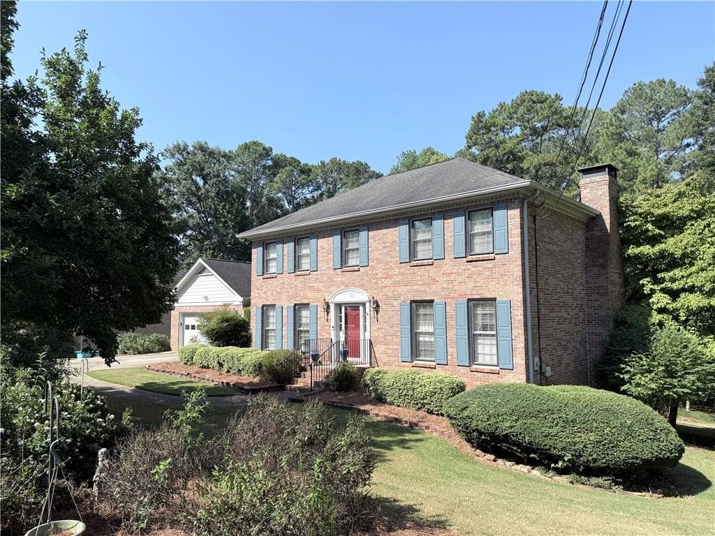 4 bedroom, 3 bathroom, 2,401 sq ft single family residence for sale at 1393 Crooked Tree Court, Lilburn, GA 30047 — photo 2