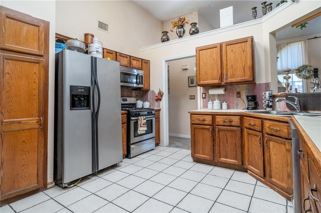 4 bedroom, 2 bathroom, 1,687 sq ft single family residence for sale at 1470 Charter Oaks Lane, Lawrenceville, GA 30046 — photo 9