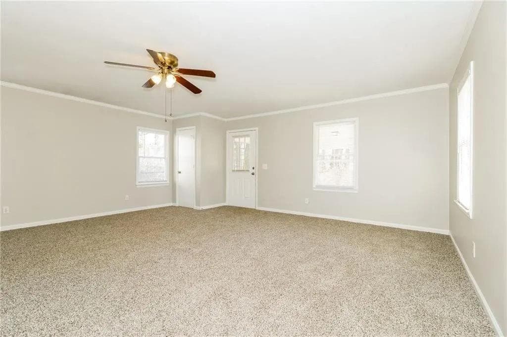 3 bedroom, 2 bathroom, 2,561 sq ft single family residence for sale at 4055 S Bogan Road, Buford, GA 30519 — photo 2