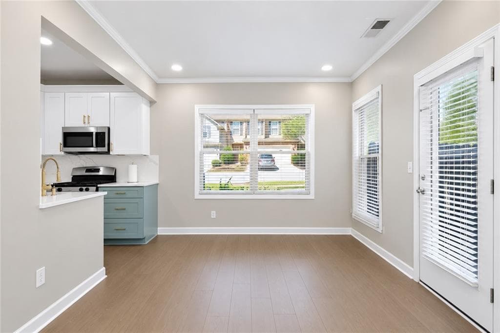 5 bedroom, 4 bathroom, 2,183 sq ft townhouse for sale at 13479 Gardiner Lane, Milton, GA 30004 — photo 8