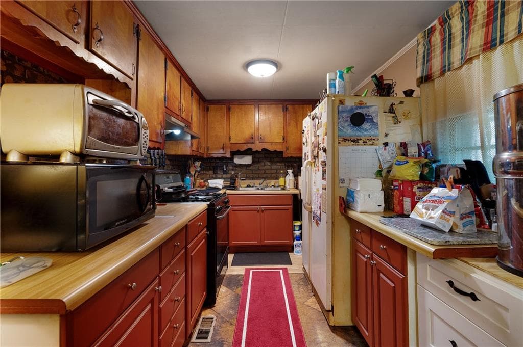 3 bedroom, 1 bathroom, 1,075 sq ft single family residence for sale at 1039 Worley Drive, Marietta, GA 30066 — photo 5