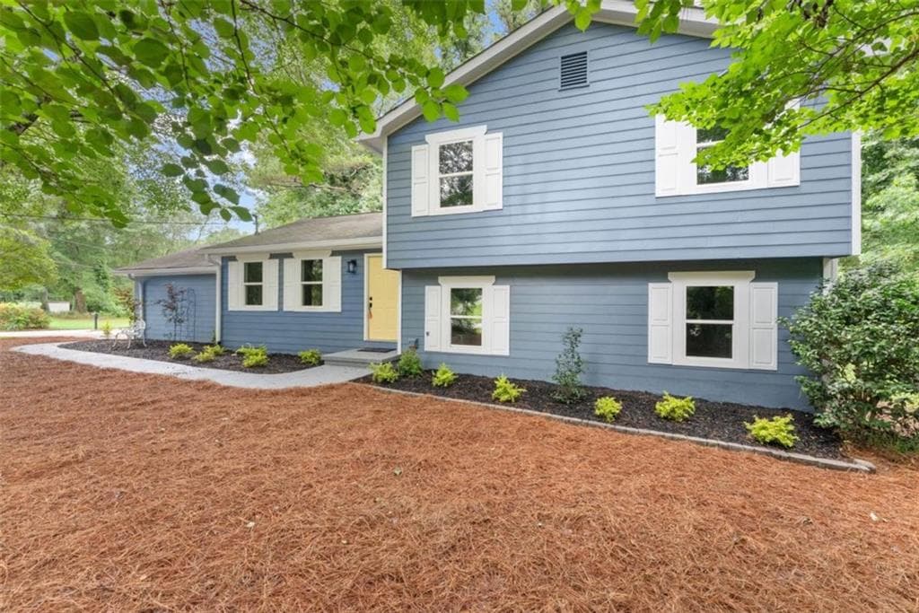 4 bedroom, 2 bathroom, 2,352 sq ft single family residence for sale at 381 Plantation Boulevard, Lawrenceville, GA 30046 — photo 2