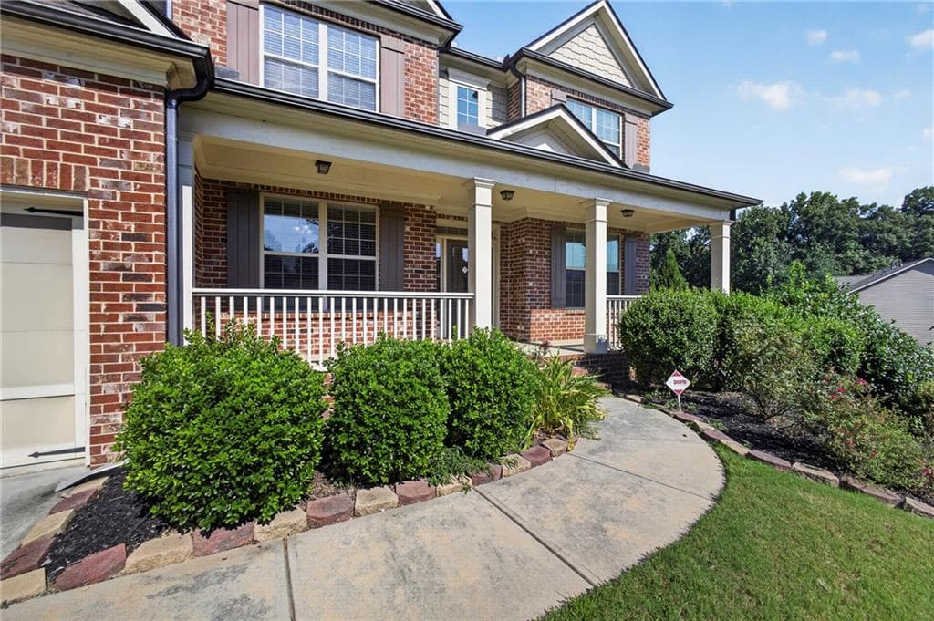 6 bedroom, 5 bathroom, 4,950 sq ft single family residence for sale at 3952 Ivy Gate Drive, Buford, GA 30519 — photo 4