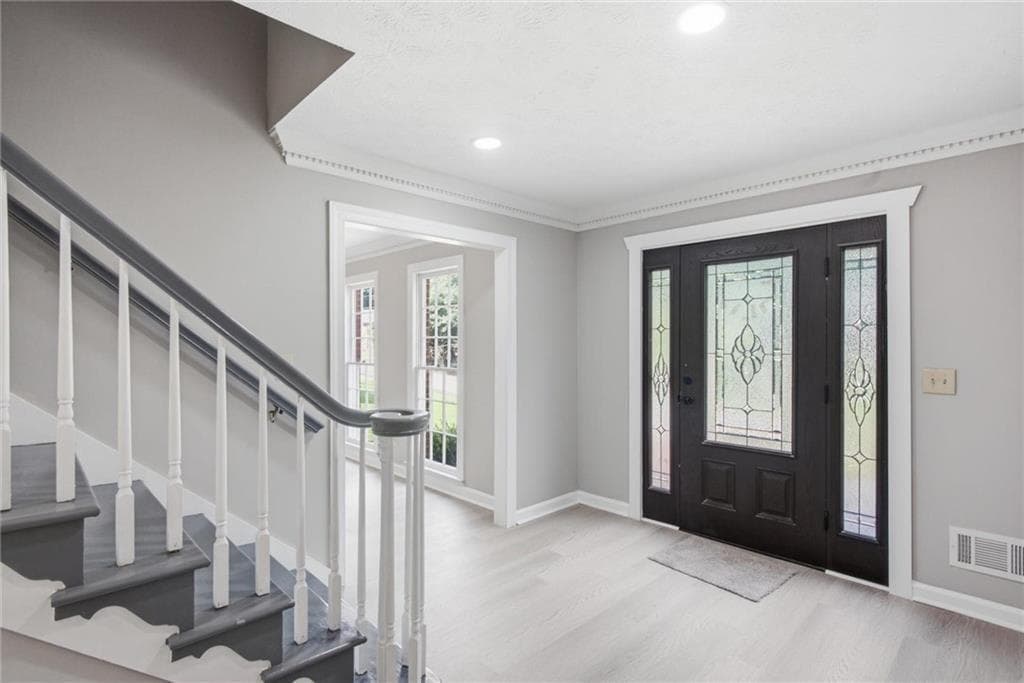 7 bedroom, 4 bathroom, 3,897 sq ft single family residence for sale at 24 Planters Drive, Lilburn, GA 30047 — photo 3