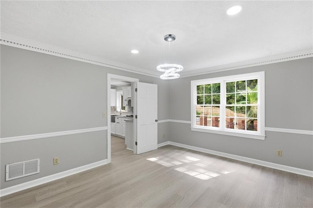 7 bedroom, 4 bathroom, 3,897 sq ft single family residence for sale at 24 Planters Drive, Lilburn, GA 30047 — photo 7