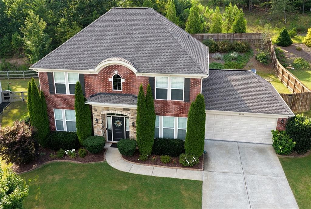 5 bedroom, 4 bathroom, 2,676 sq ft single family residence for sale at 1935 Bromwick Court, Cumming, GA 30040 — photo 2