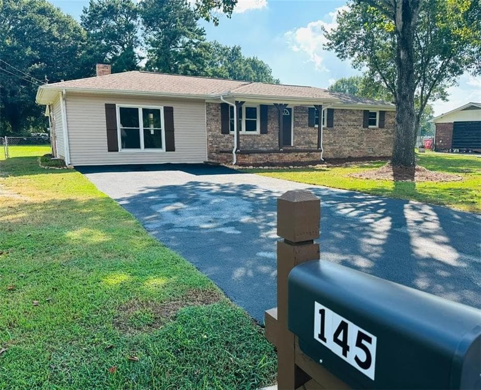 3 bedroom, 2 bathroom, 1,647 sq ft single family residence for sale at 145 Cardinal Drive, Calhoun, GA 30701 — photo 2