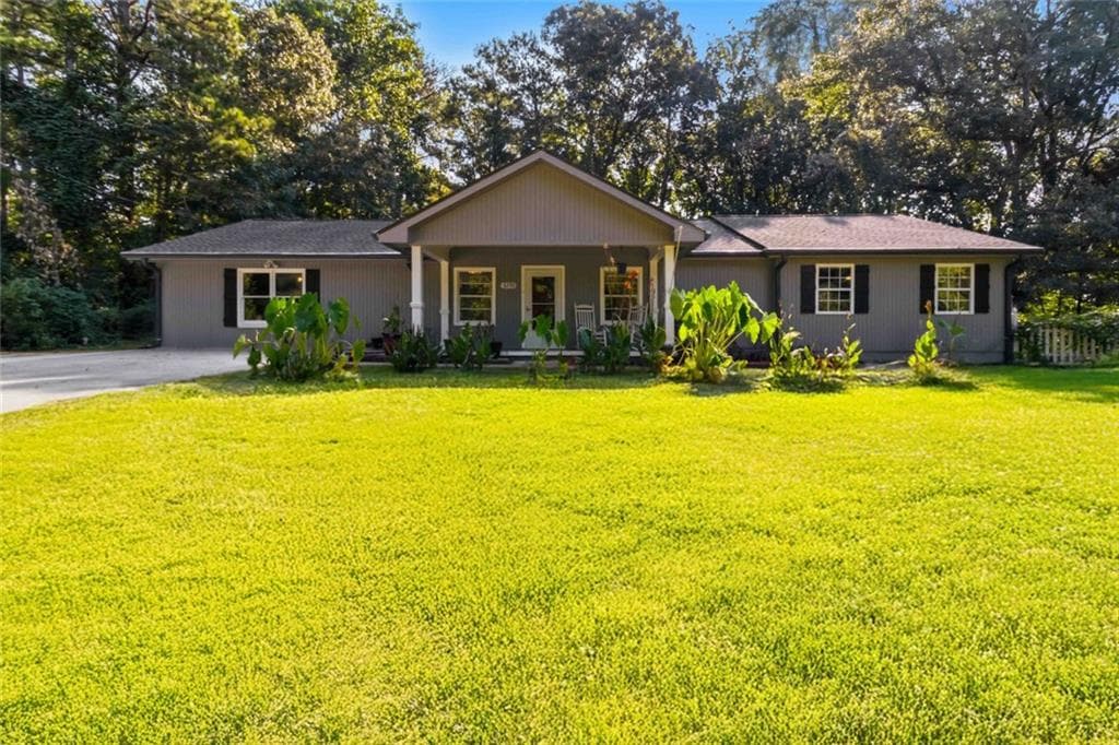 4 bedroom, 3 bathroom, 2,700 sq ft single family residence for sale at 3290 Stonewall Tell Road, Atlanta, GA 30349