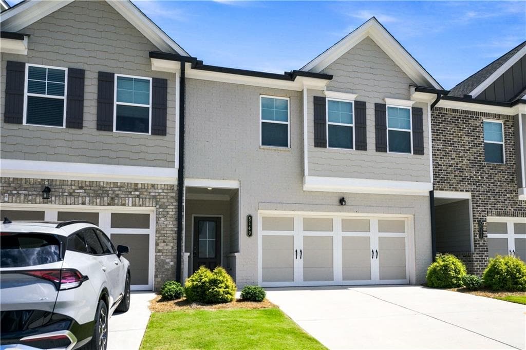 4 bedroom, 3 bathroom, 1,966 sq ft townhouse for rent at 5149 Fox Den Road, Oakwood, GA 30566 for $2,100 a month — photo 1 of 29