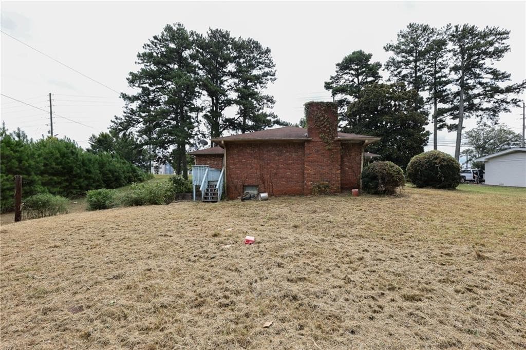 4 bedroom, 2 bathroom, 3,228 sq ft single family residence for sale at 3551 Cherokee Street, Kennesaw, GA 30144 — photo 5