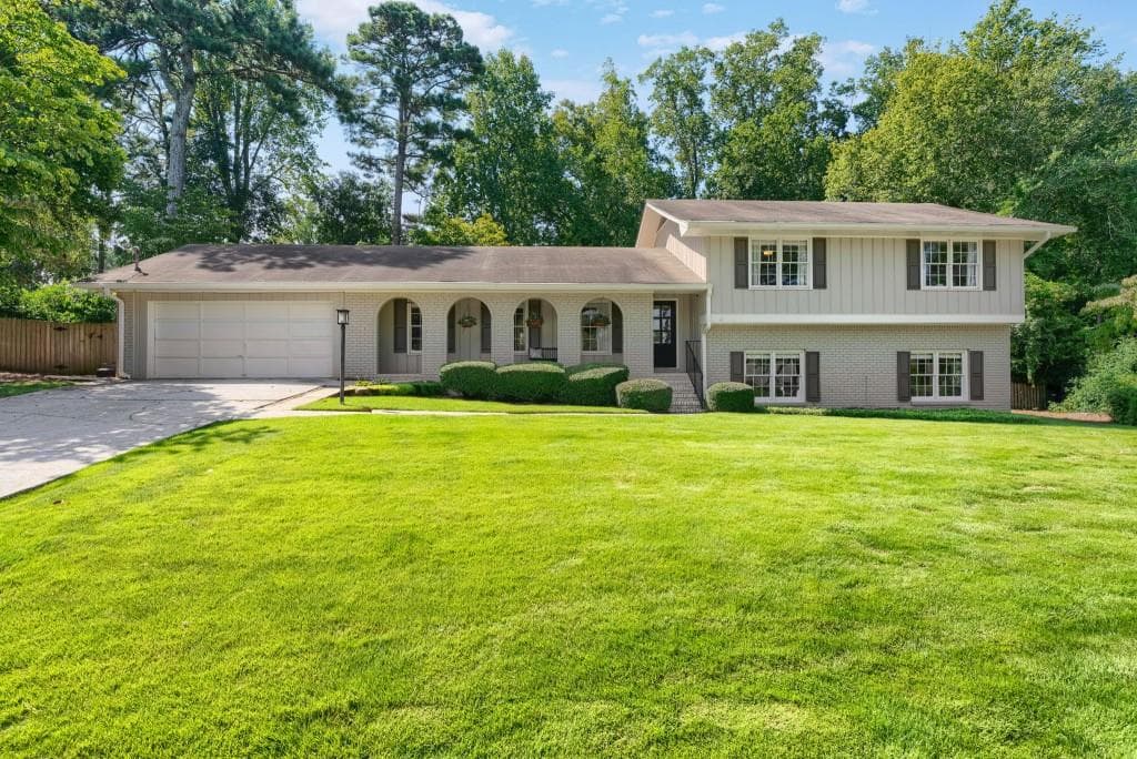 4 bedroom, 3 bathroom, 3,554 sq ft single family residence sold at 1475 Carnaby Court, Dunwoody, GA 30338