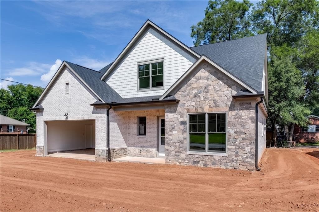 4 bedroom, 5 bathroom, 3,360 sq ft single family residence for sale at 11 Stonehedge Drive, Buford, GA 30518 — photo 2