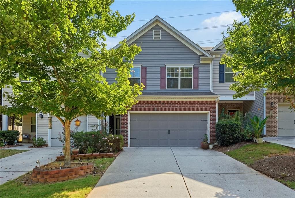 3 bedroom, 3 bathroom, 1,671 sq ft townhouse for sale at 1250 Rubble Road, Cumming, GA 30040 — photo 1 of 30