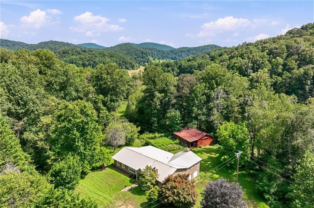 4 bedroom, 3 bathroom, 2,386 sq ft single family residence for sale at 7925 State Hwy 60, Suches, GA 30572