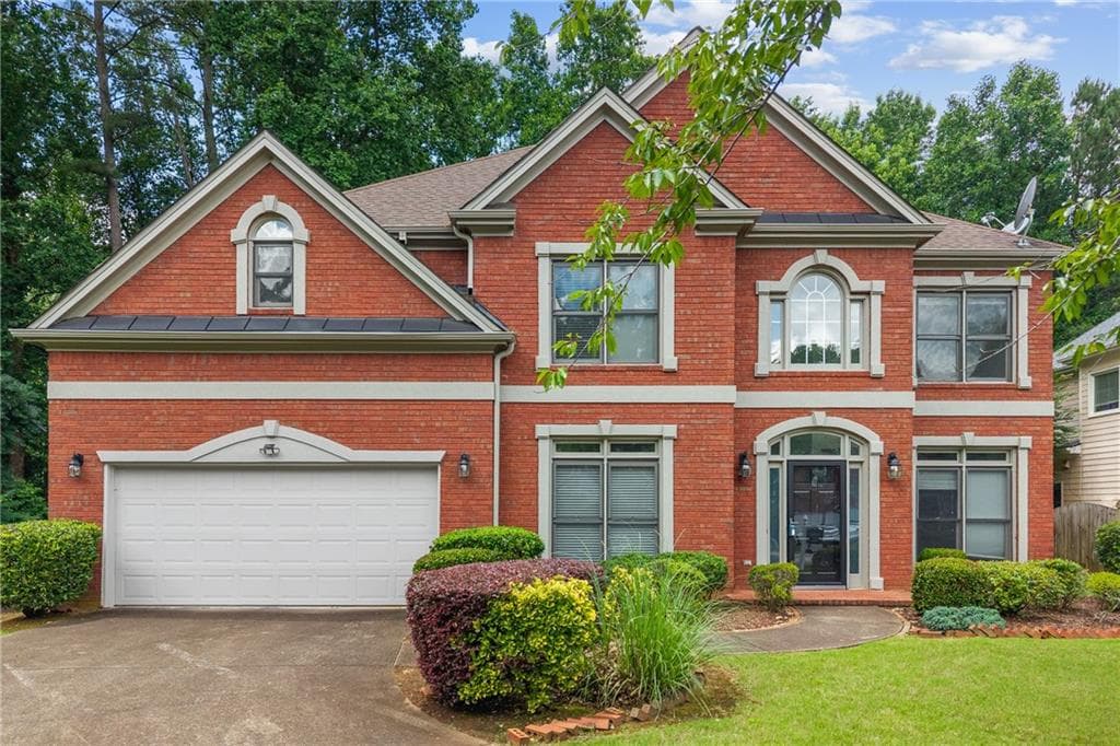 4 bedroom, 3 bathroom, 3,063 sq ft single family residence for sale at 1651 Nestle Creek Court, Marietta, GA 30062 — photo 1 of 29