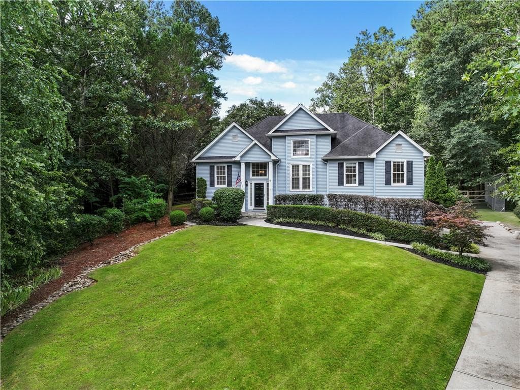 4 bedroom, 3 bathroom, 2,930 sq ft single family residence for sale at 8260 Stonebrook Court, Cumming, GA 30040 — photo 1 of 51