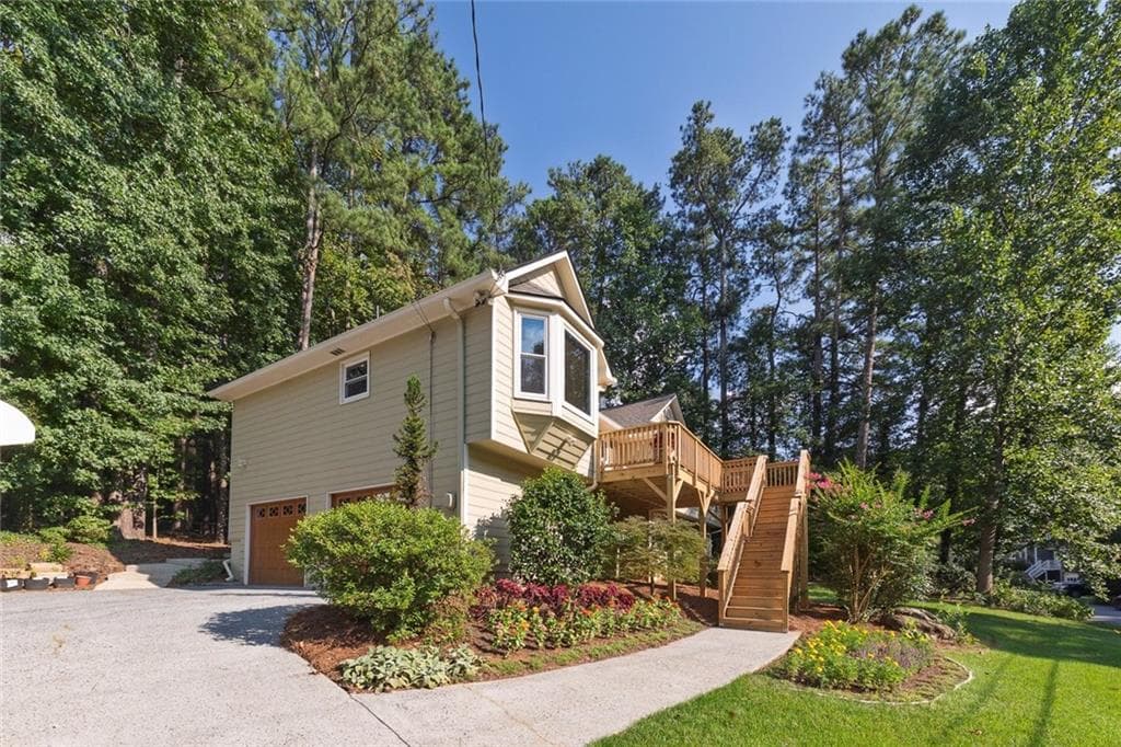 4 bedroom, 3 bathroom, 2,242 sq ft single family residence for sale at 2363 Wilderness Way, Marietta, GA 30066 — photo 2