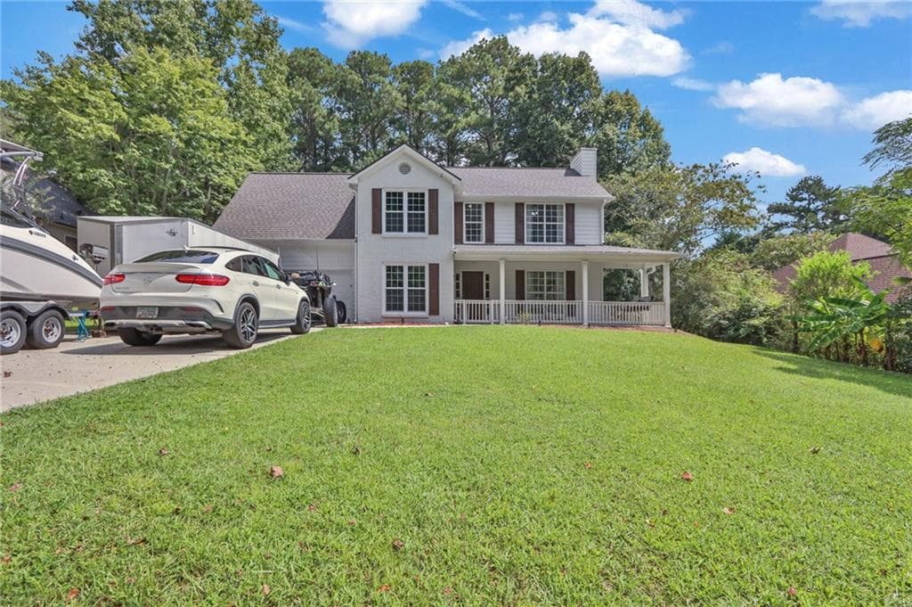 5 bedroom, 3 bathroom, 2,122 sq ft single family residence for sale at 3130 Hall Garden Road, Snellville, GA 30039 — photo 2