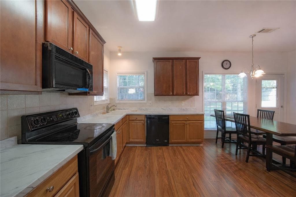 5 bedroom, 3 bathroom, 2,765 sq ft single family residence for sale at 1098 Whisperwood Lane, Lawrenceville, GA 30043 — photo 7