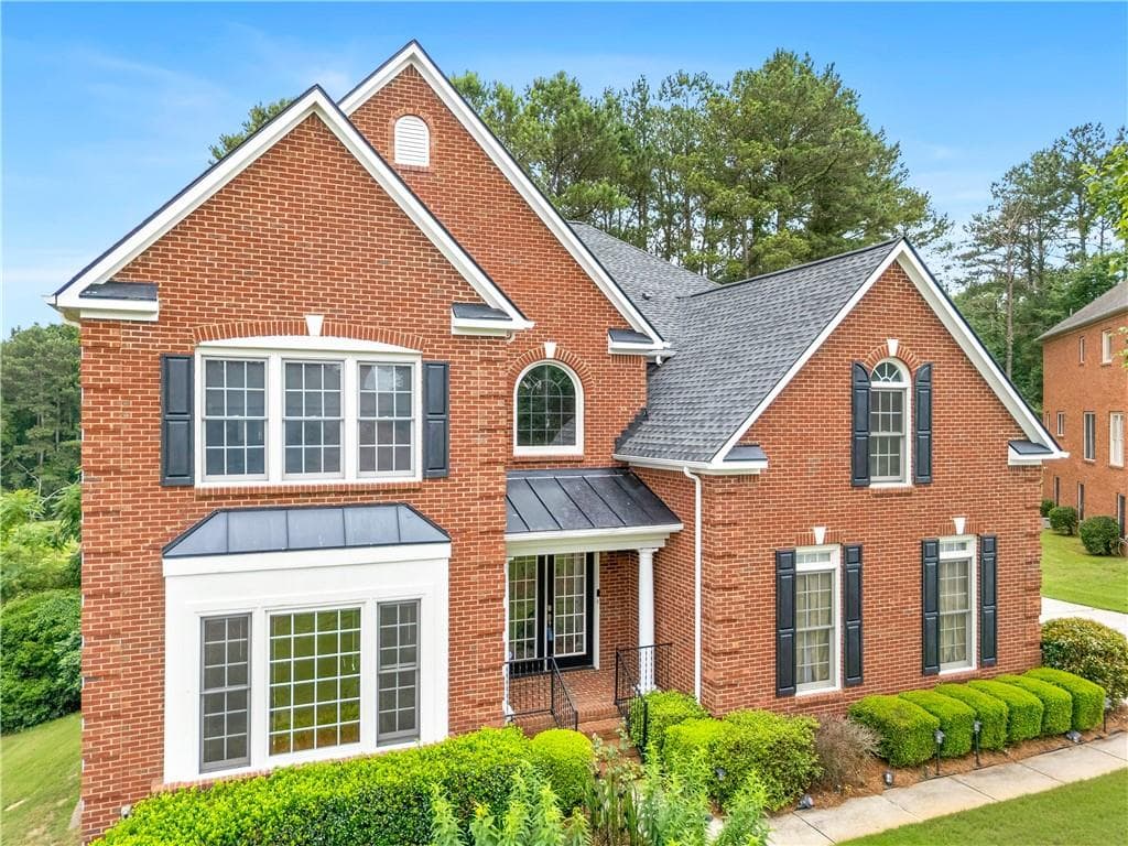 5 bedroom, 5 bathroom, 5,953 sq ft single family residence under contract at 911 Masters Walk, Stone Mountain, GA 30087 — photo 2