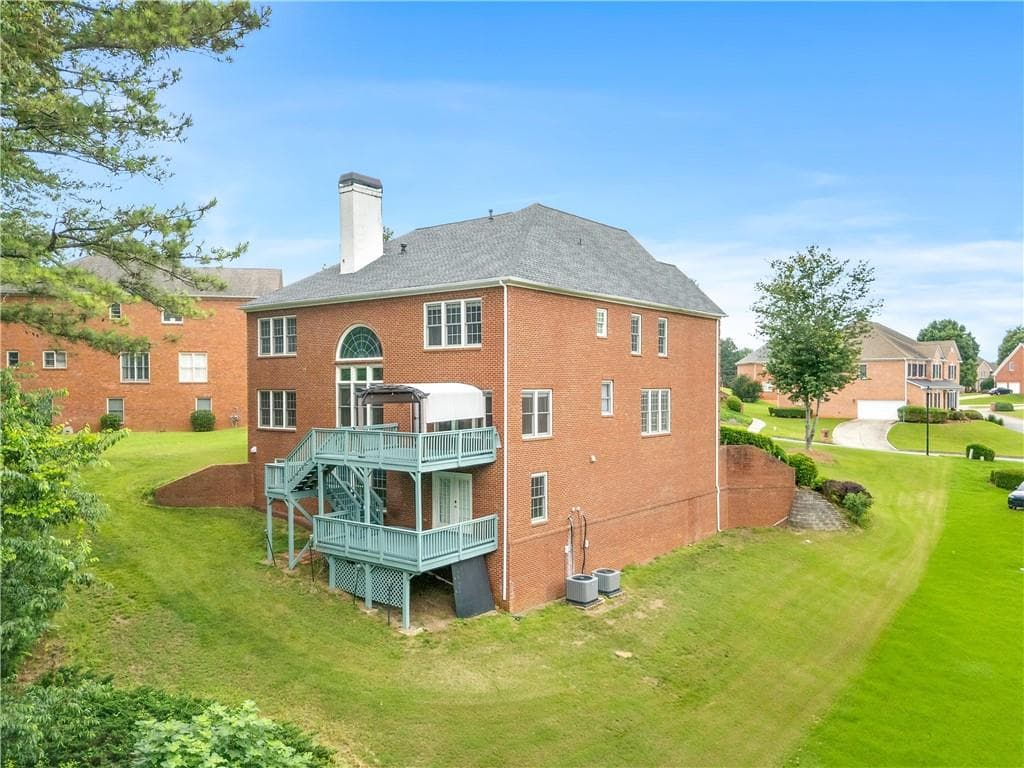 5 bedroom, 5 bathroom, 5,953 sq ft single family residence under contract at 911 Masters Walk, Stone Mountain, GA 30087 — photo 4