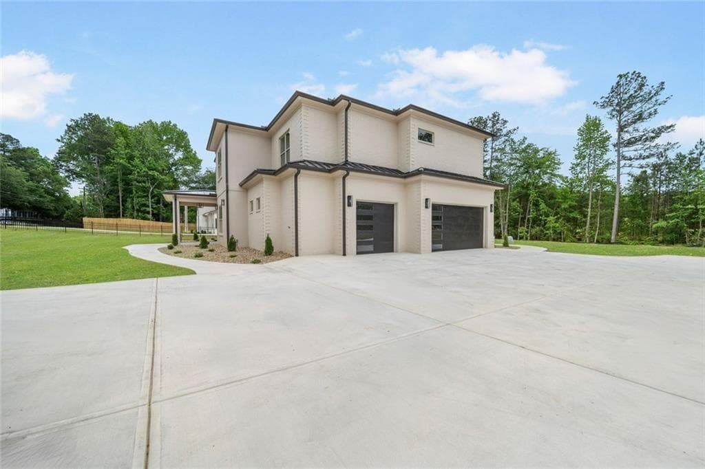 5 bedroom, 5 bathroom, 6,667 sq ft single family residence for sale at 210 Simonton Road, Lawrenceville, GA 30046 — photo 2