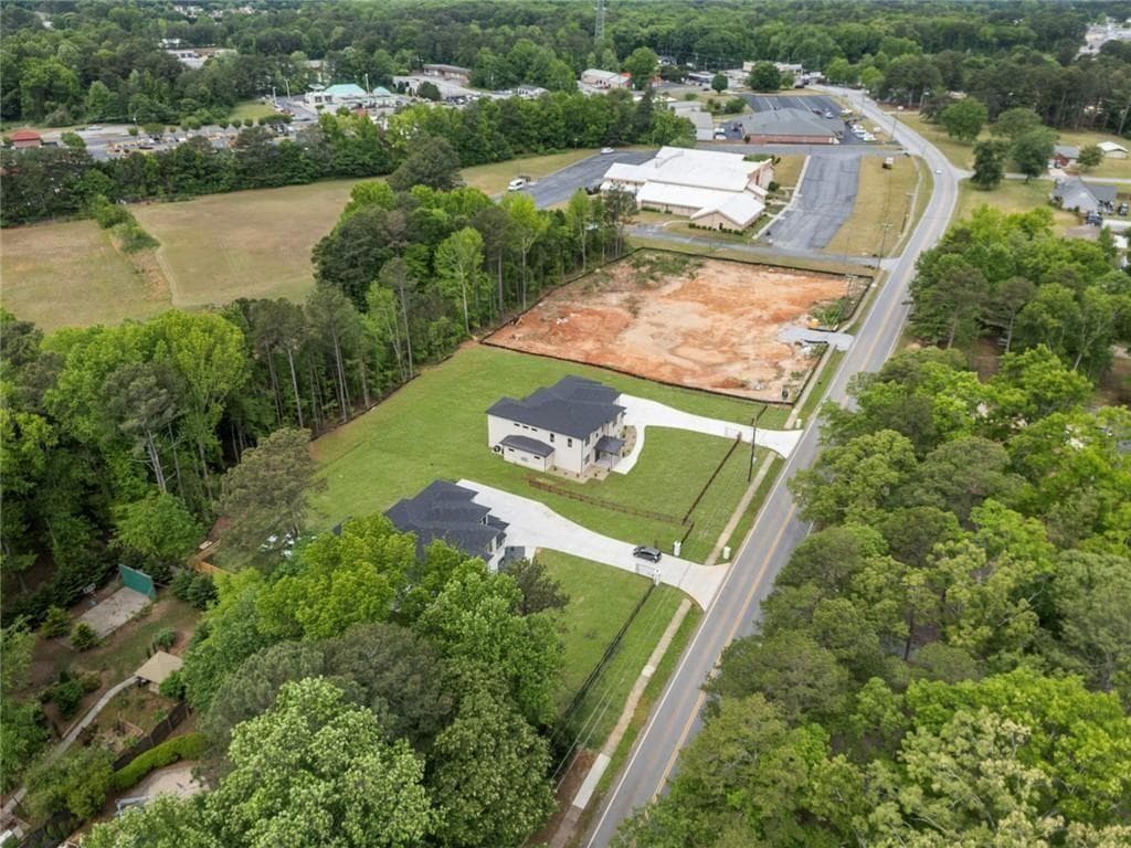 5 bedroom, 5 bathroom, 6,667 sq ft single family residence for sale at 210 Simonton Road, Lawrenceville, GA 30046 — photo 4