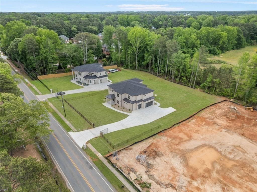5 bedroom, 5 bathroom, 6,667 sq ft single family residence for sale at 210 Simonton Road, Lawrenceville, GA 30046 — photo 5