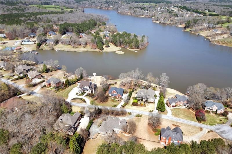 4 bedroom, 6 bathroom, 4,953 sq ft single family residence for sale at 7332 Lake Walton Boulevard, Covington, GA 30014 — photo 2