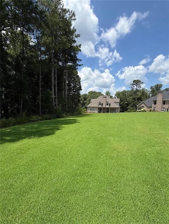 6 bedroom, 4 bathroom, 5,462 sq ft single family residence for sale at 3574 Graycliff Rd, Snellville, GA 30039 — photo 2