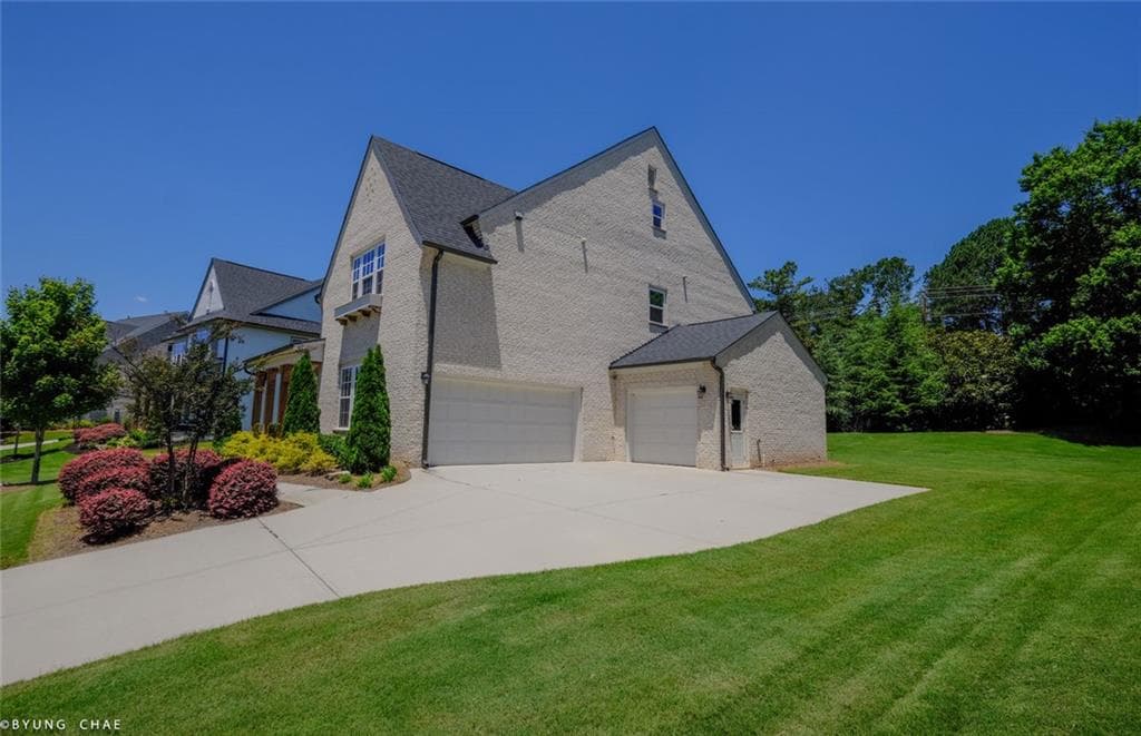 6 bedroom, 5 bathroom, 4,141 sq ft single family residence for sale at 5048 Dinant Drive, Johns Creek, GA 30022 — photo 2
