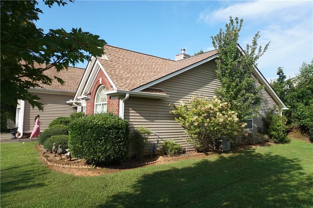 4 bedroom, 2 bathroom, 2,124 sq ft single family residence for sale at 1603 Leather Lake Court, Lawrenceville, GA 30043 — photo 2