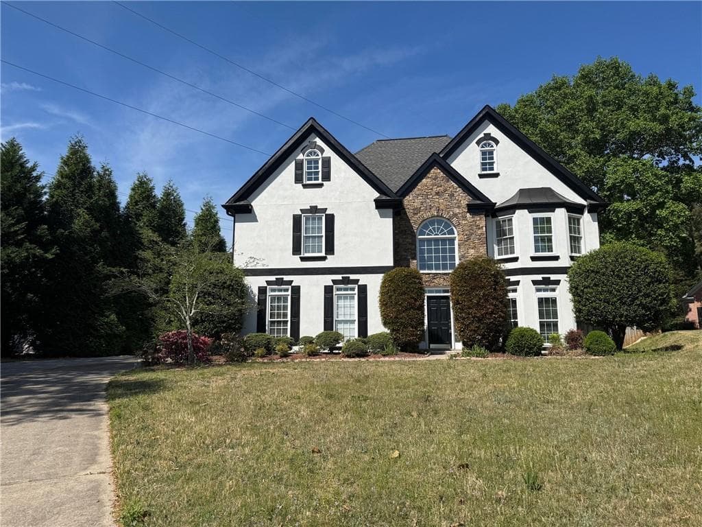 4 bedroom, 3 bathroom, 2,840 sq ft single family residence for sale at 7370 Glenmaura Way, Suwanee, GA 30024 — photo 5
