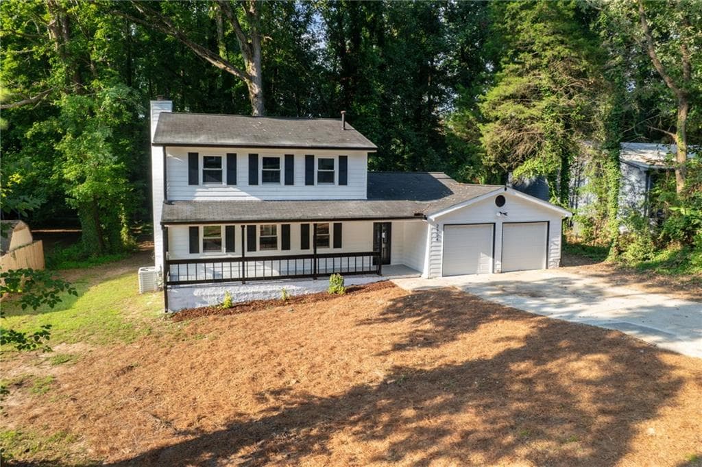 4 bedroom, 3 bathroom, 1,690 sq ft single family residence for sale at 2904 Wood Hollow Lane, Jonesboro, GA 30236 — photo 3