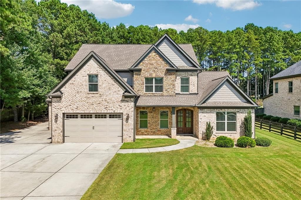 4 bedroom, 4 bathroom, 3,515 sq ft single family residence under contract at 1982 Old Peachtree Road, Lawrenceville, GA 30043 — photo 2
