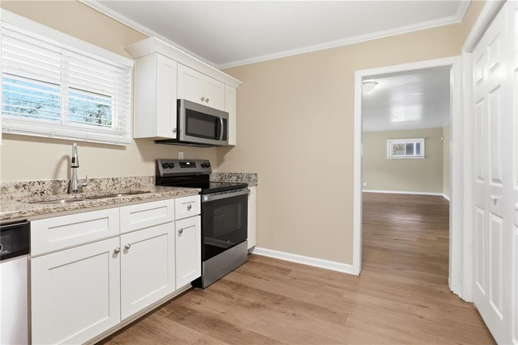 2 bedroom, 1 bathroom, 1,158 sq ft single family residence for sale at 2318 Ousley Court, Decatur, GA 30032 — photo 9