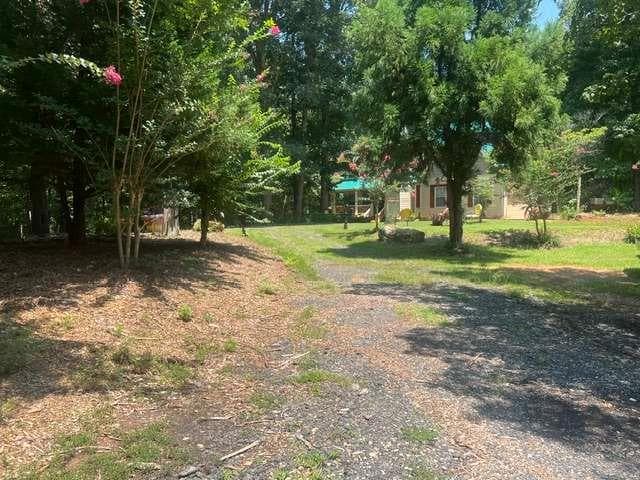 6 bedroom, 4 bathroom, 3,301 sq ft single family residence for sale at 1014 Miss Amber Way, Locust Grove, GA 30248 — photo 6