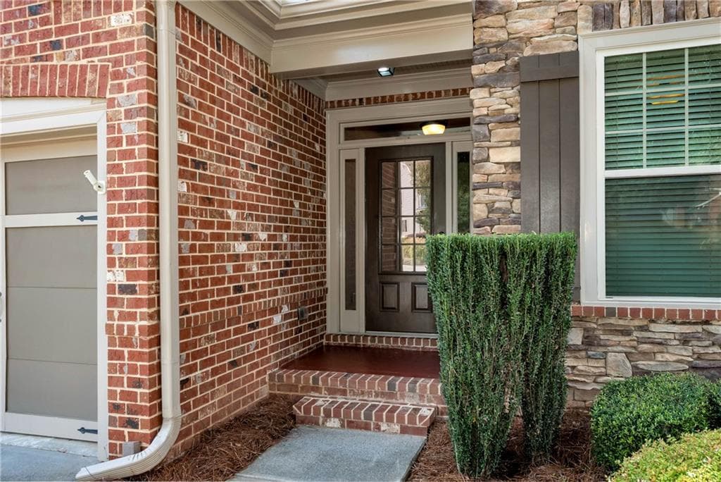 6 bedroom, 6 bathroom, 4,971 sq ft single family residence for sale at 3990 Sweeting Street, Cumming, GA 30041 — photo 2