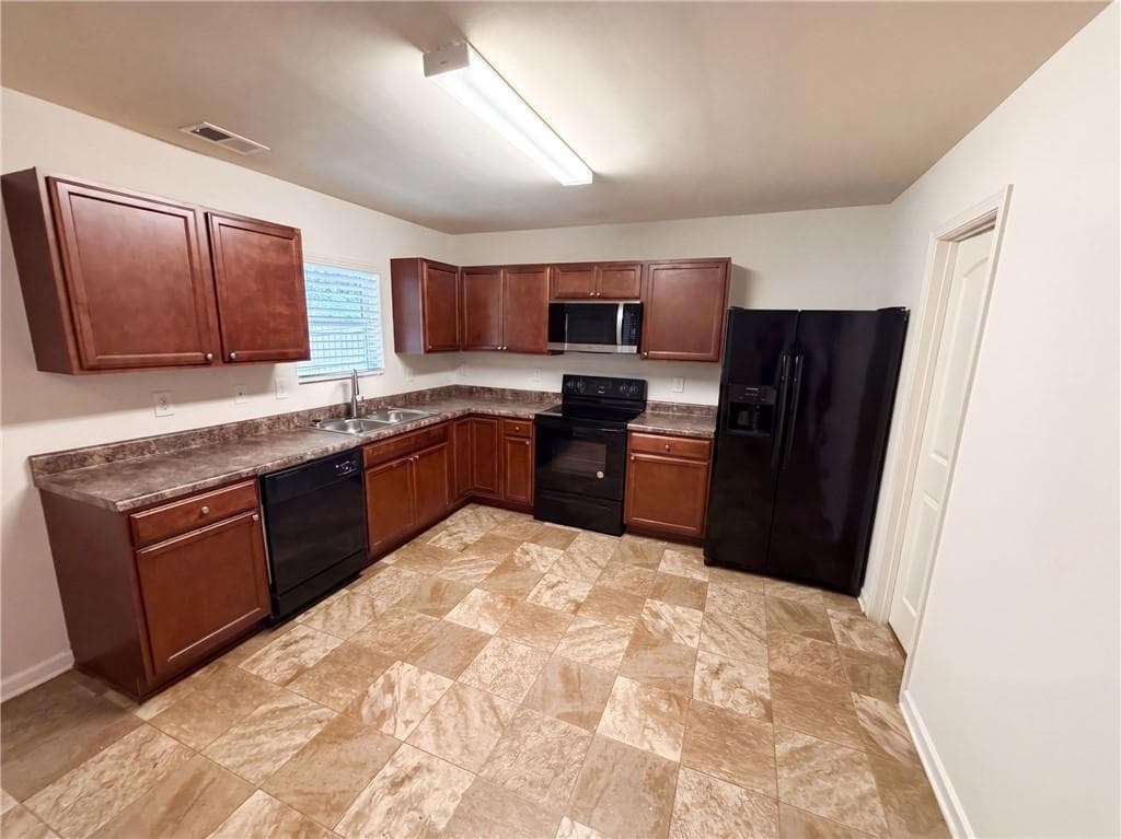 4 bedroom, 3 bathroom, 1,813 sq ft single family residence for sale at 3267 Talkeetna Road, Douglasville, GA 30135 — photo 2