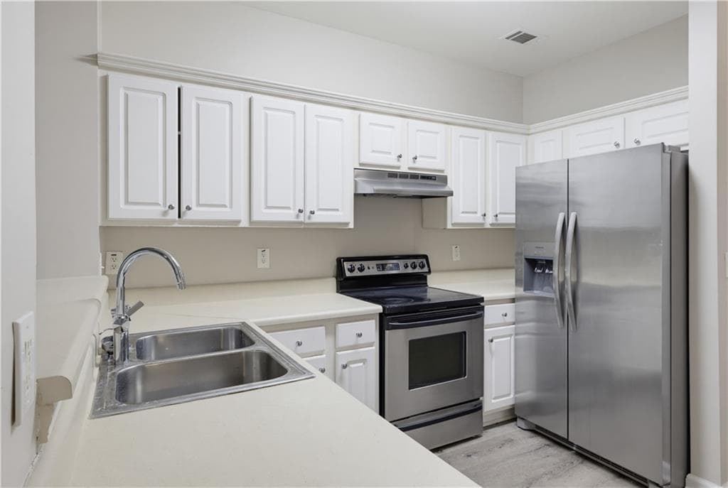 2 bedroom, 3 bathroom, 1,418 sq ft townhouse for sale at 7076 Biltmore Trace, Lithonia, GA 30058 — photo 10