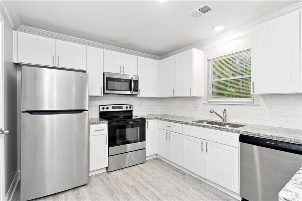 3 bedroom, 3 bathroom, 1,613 sq ft single family residence for rent at 5239 Hanover Street, Atlanta, GA 30349 for $1,995 a month — photo 2