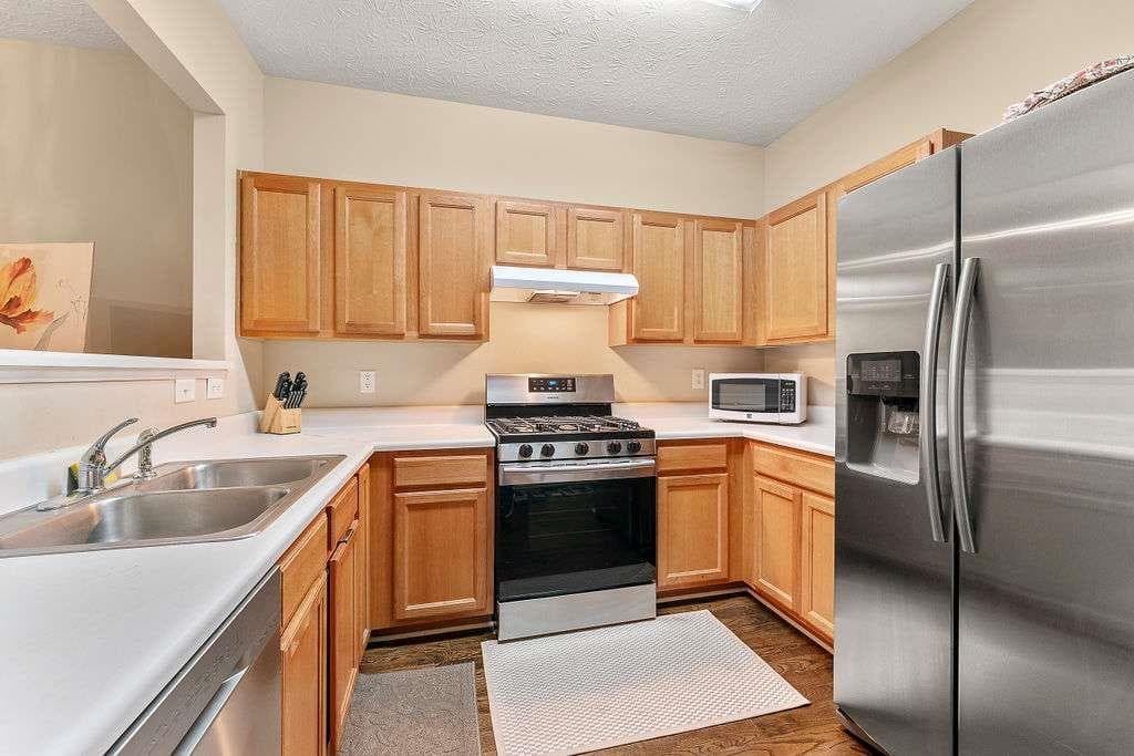 2 bedroom, 3 bathroom, 1,408 sq ft single family residence for sale at 1343 Penhurst Drive, Lawrenceville, GA 30043 — photo 4