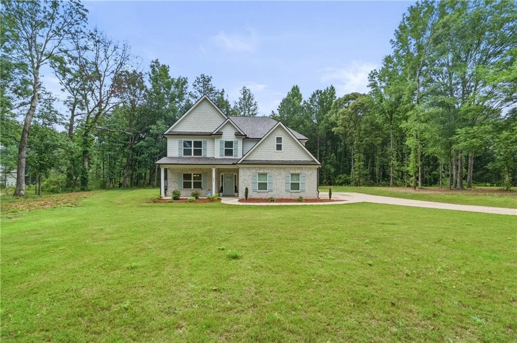5 bedroom, 3 bathroom, 2,842 sq ft single family residence for sale at 656 East Lake Road, Mcdonough, GA 30252