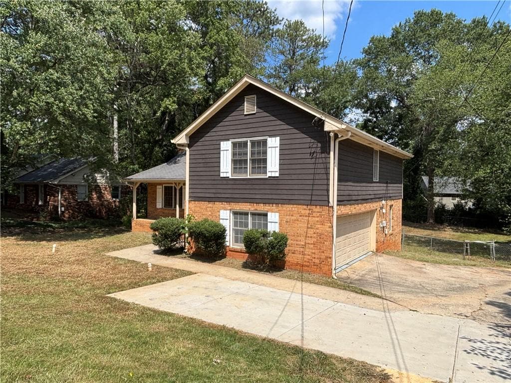4 bedroom, 3 bathroom, 2,186 sq ft single family residence for sale at 676 Killian Hill Road, Lilburn, GA 30047