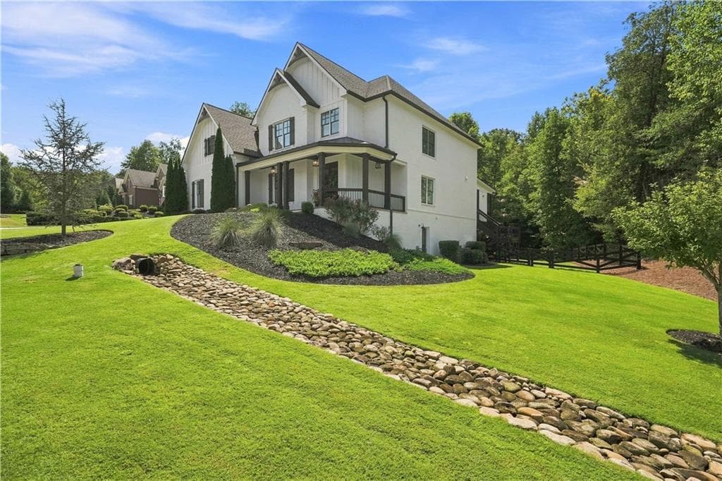 5 bedroom, 6 bathroom, 5,079 sq ft single family residence under contract at 6025 Pebblestone Lane, Cumming, GA 30040 — photo 2