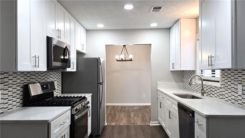 4 bedroom, 2 bathroom, 1,858 sq ft single family residence for sale at 2667 Camelot Court, Duluth, GA 30096 — photo 3
